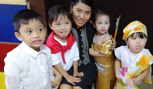 Ms. Charisse Cambala with her Toddler class : Raeven Rence R. Romanes, Stephen Kyrie T.  Marquez, Nadine Daenerys B. Daplas, Mia Juliana G. Matro